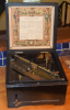 an image of Eight and one quarter inch Symphonion music box with 38 discs